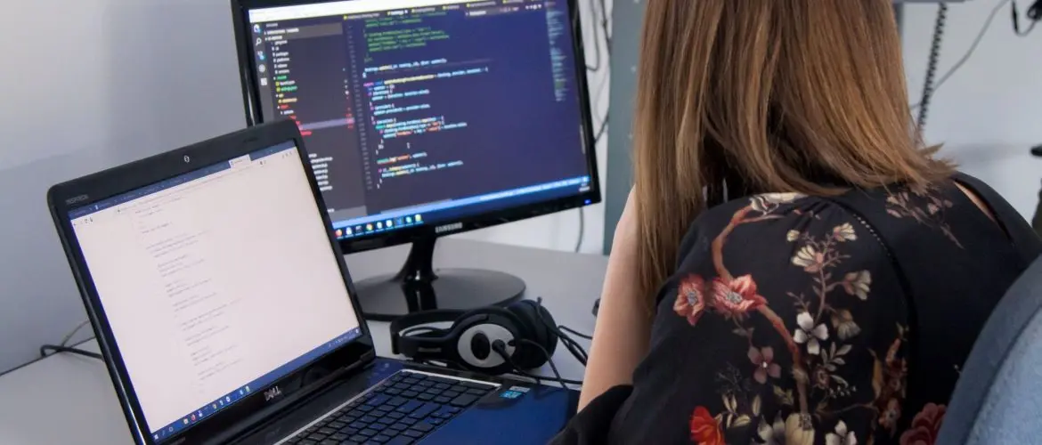 developer women working working at monitor