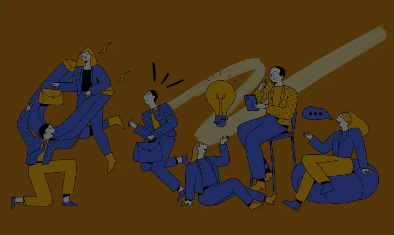 group of people brainstorming ideas around a table with a glowing light bulb in the center